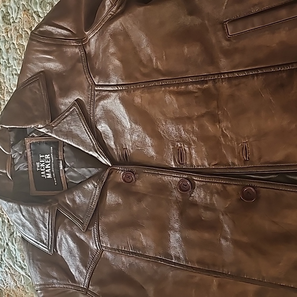 Newt backo Brown leather jacket. Meet by the jacket maker. Size extra large.